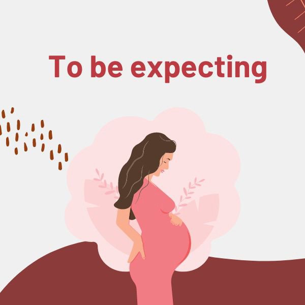 Người phụ nữ đang ôm bụng bầu