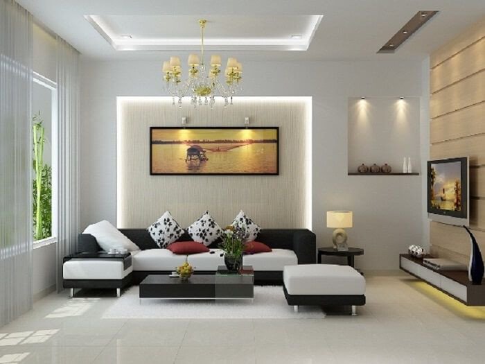 Phòng khách nhỏ gọn, ấm cúng với sofa trắng và thảm sàn