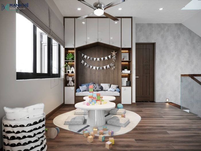 Phòng khách rộng rãi với thảm xanh, sofa và giá sách lớn